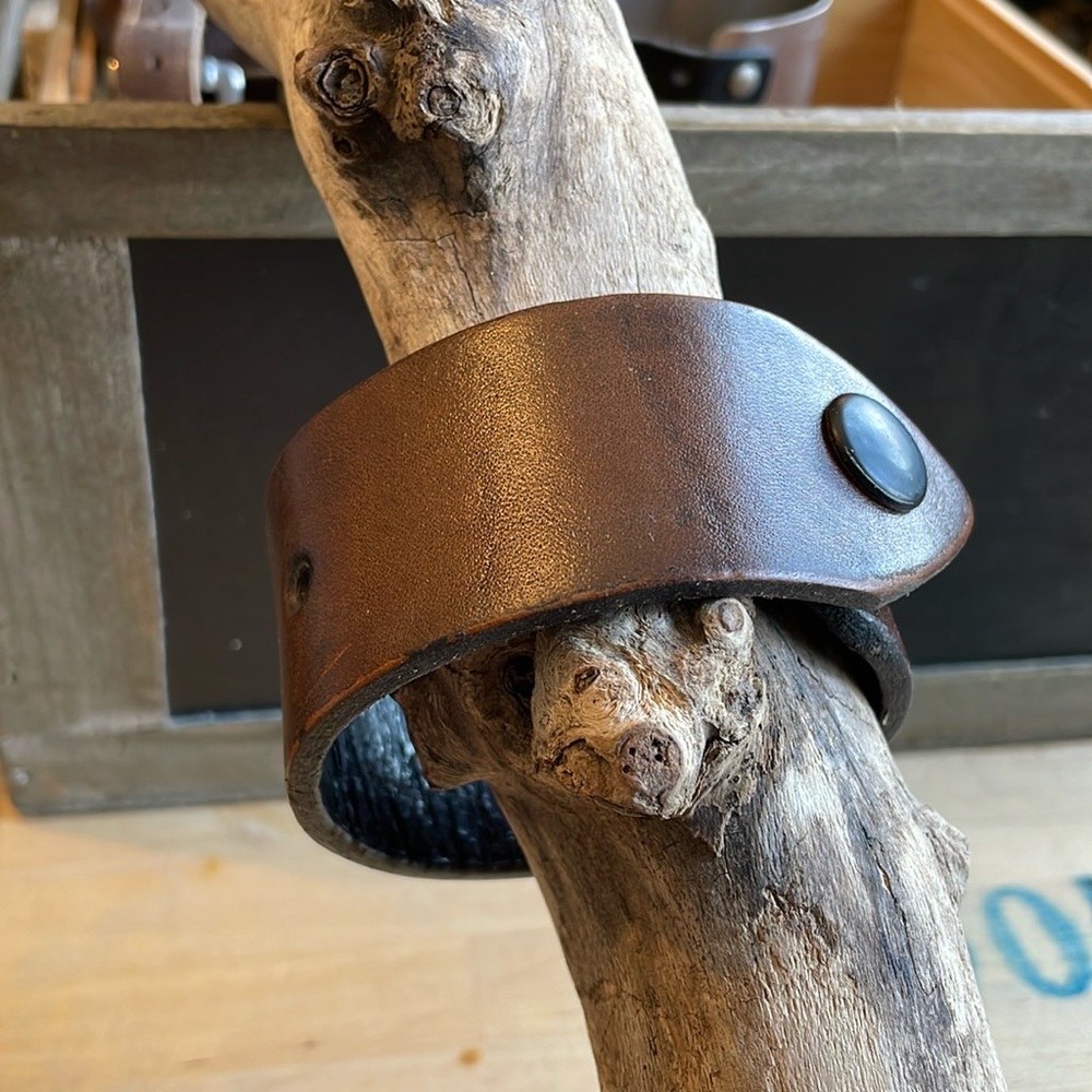 Thick brown leather cuff bracelet with black snap 10”